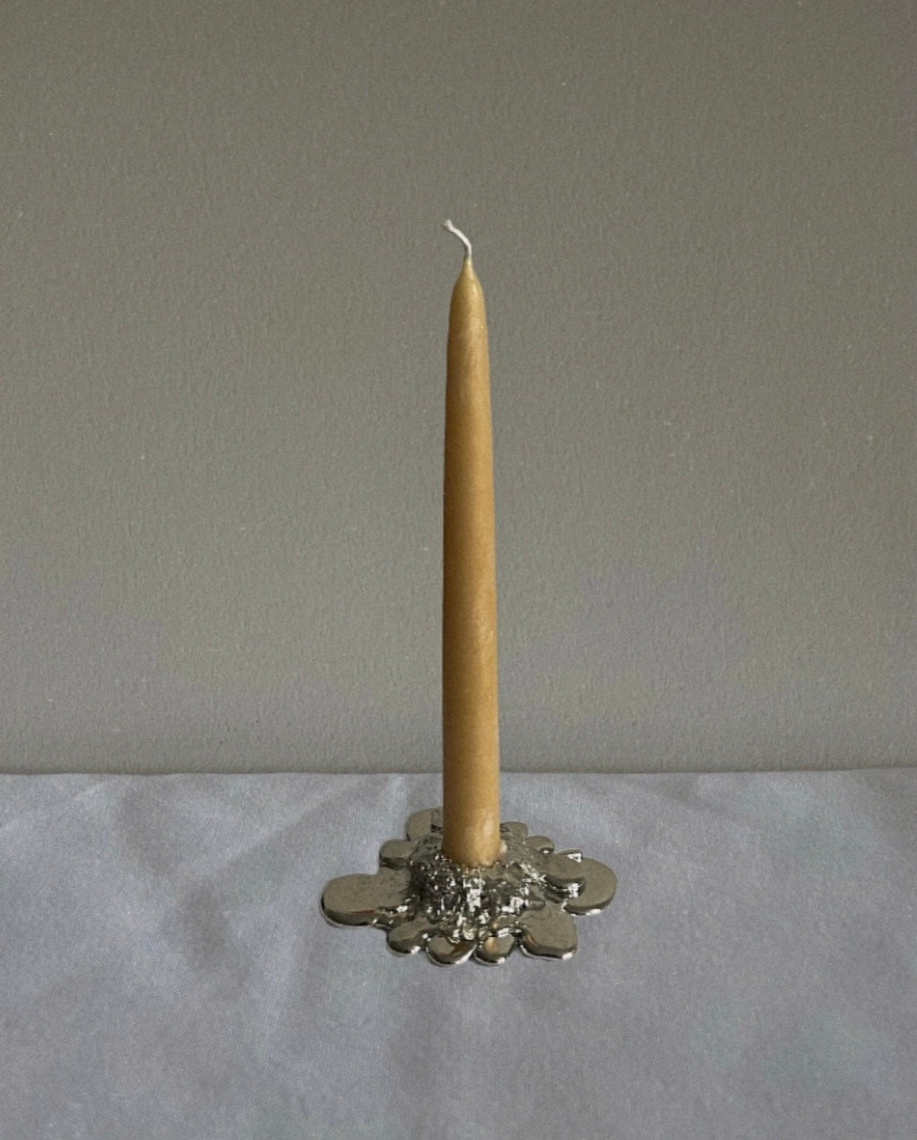 Melt candle holder